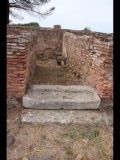 05287 ostia - regio iii - insula xii - insula xiii - casette tipo (iii,xii,1-2 - iii,xiii,1-2) - via della casette tipo - westseite - treppe - latrine - 09-2023.jpg